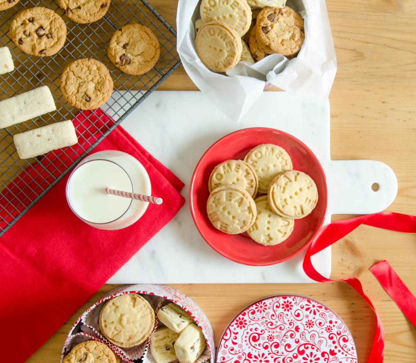 Starpack 3-pack cookie tins with festive designs, perfect for storing and gifting homemade cookies