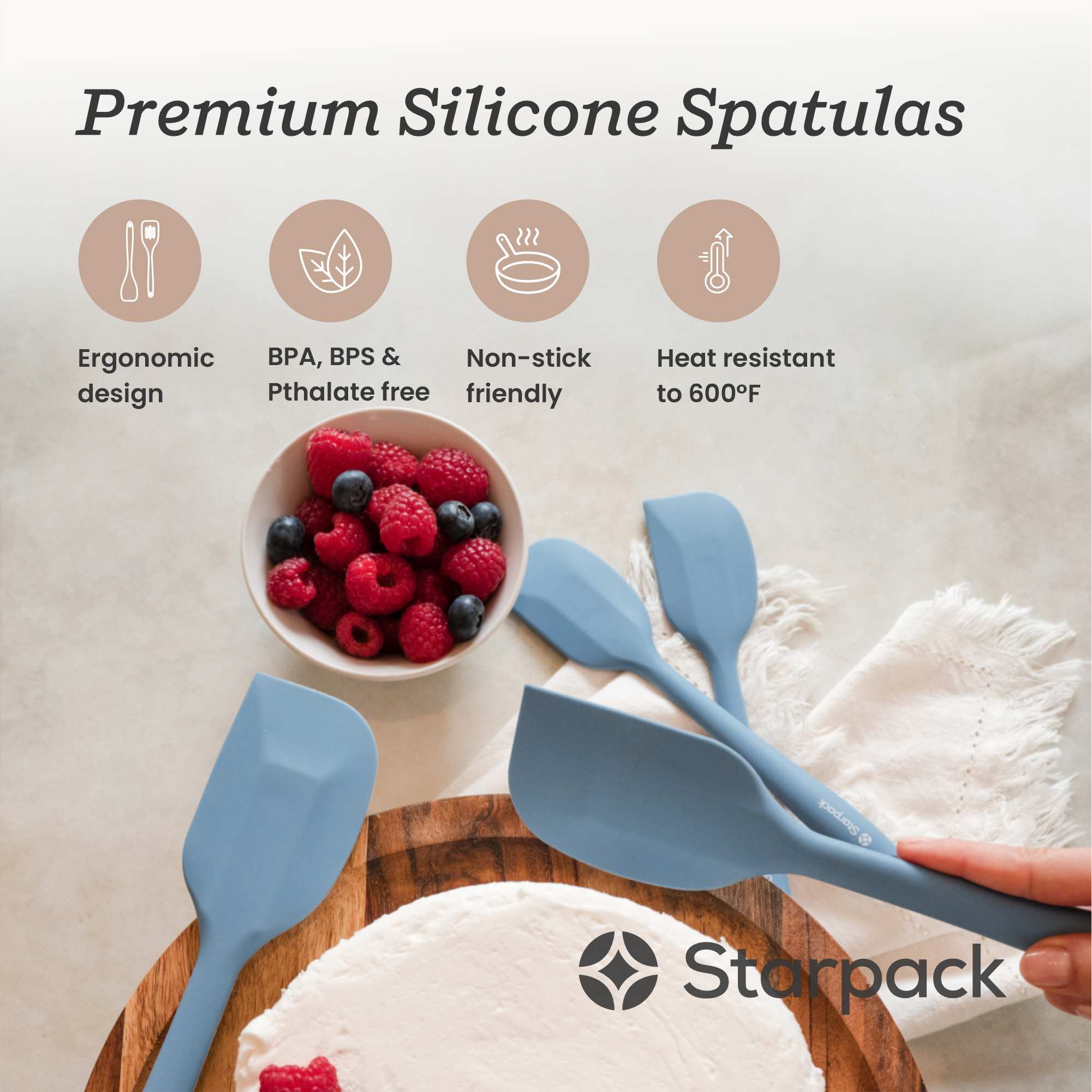 Starpack silicone spatula with a flexible, heat-resistant head and a comfortable handle, ideal for scraping and mixing.